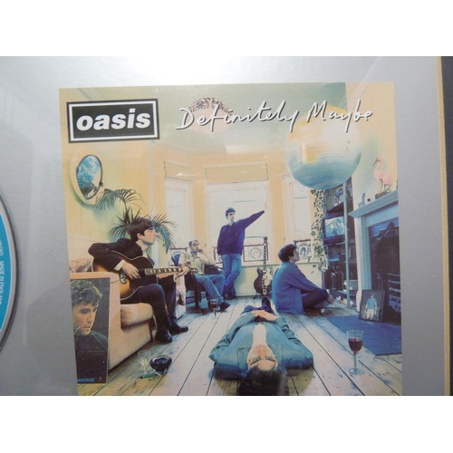 136 - Oasis, Definitely Maybe - an In-house award mounted CD Disk, presented to Matrix Maison Rouge to rec... 