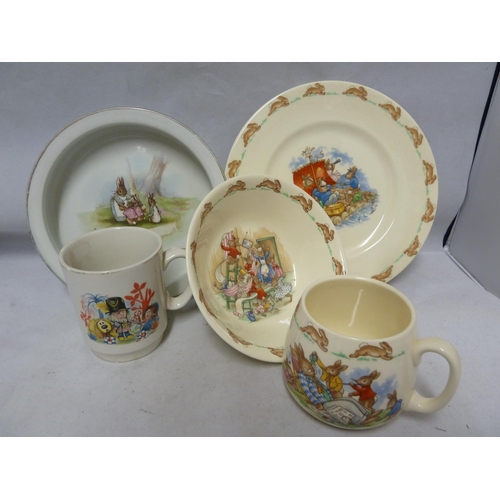 146 - Bunnykins, Royal Doulton - Nursery ware, comprising, mug, bowl and plate; a Grimwades Peter Rabbit c... 