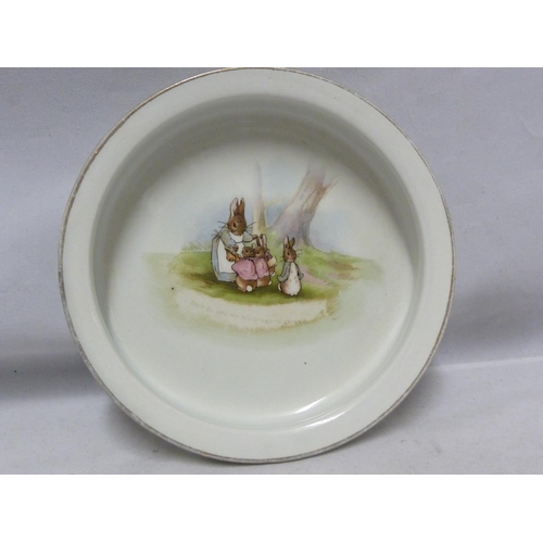 146 - Bunnykins, Royal Doulton - Nursery ware, comprising, mug, bowl and plate; a Grimwades Peter Rabbit c... 