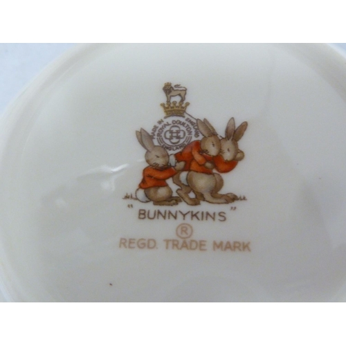 146 - Bunnykins, Royal Doulton - Nursery ware, comprising, mug, bowl and plate; a Grimwades Peter Rabbit c... 