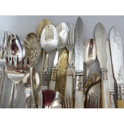 20 - A quantity of EPNS cutlery, mostly fancy wares - jam spoons; a cased set of berry spoons; and other ... 