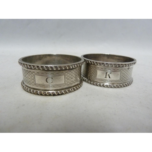 23 - Seven silver napkin rings, including two pairs, various dates and makers, 190 grms approx (7)