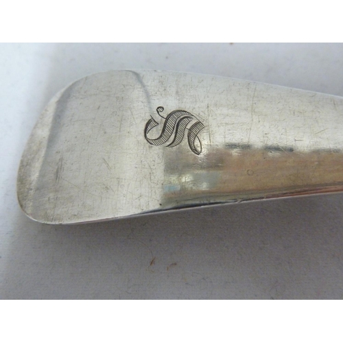 25 - A silver stuffing spoon, rat tail, London 1913, makers mark of W over SD H Ltd for William Hutton & ... 