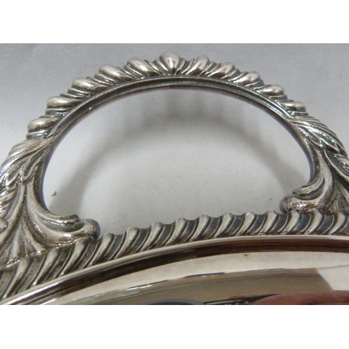 30 - A large silver plated two handled tray, of oval shape, 58cm max diam approx; and one large circular ... 