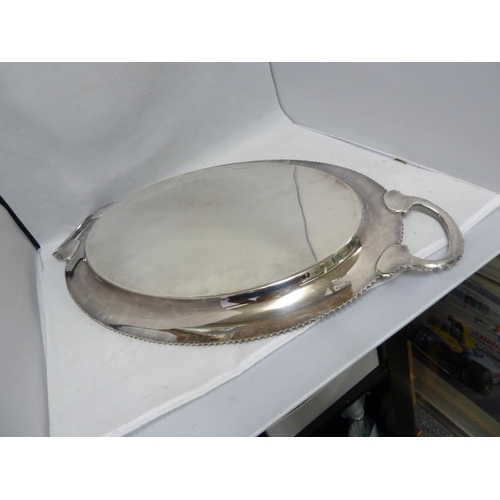 30 - A large silver plated two handled tray, of oval shape, 58cm max diam approx; and one large circular ... 