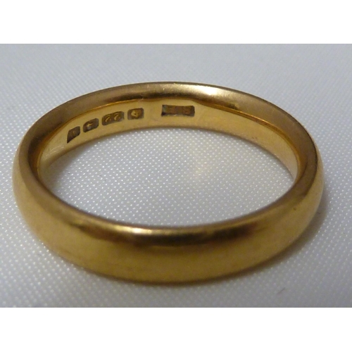 16 - Four gold wedding rings comprising: a 22ct yellow gold band, 5.5grms approx, ring size L; a 22ct yel... 