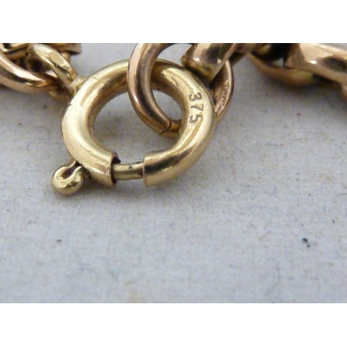 32 - A yellow metal muff chain, stamped 375 to clasp, belcher type link, 160cm approx, 49 grms approx