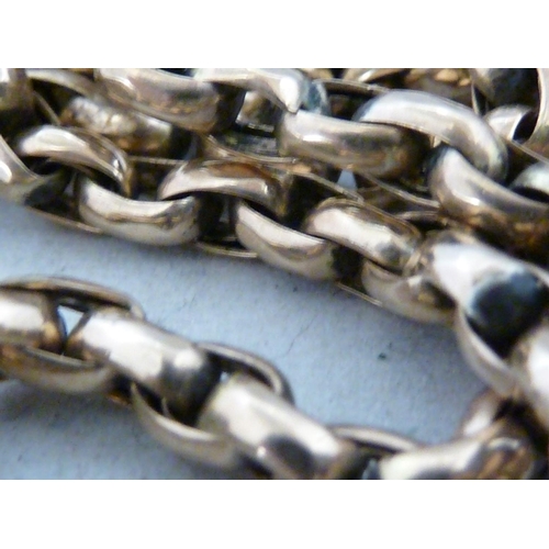 32 - A yellow metal muff chain, stamped 375 to clasp, belcher type link, 160cm approx, 49 grms approx