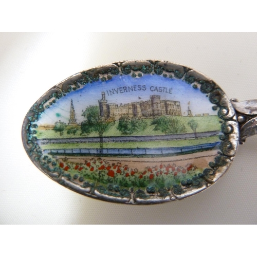 58 - Scottish Interest - An Inverness enamelled souvenir spoon; a souvenir of Glasgow miniature charm boo... 