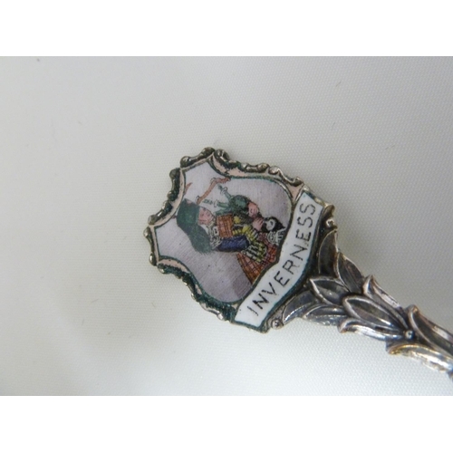 58 - Scottish Interest - An Inverness enamelled souvenir spoon; a souvenir of Glasgow miniature charm boo... 