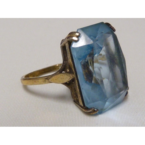 53 - An aquamarine set ring, set in pierced yellow metal, stamped with Arabic marks; a marquise ring and ... 