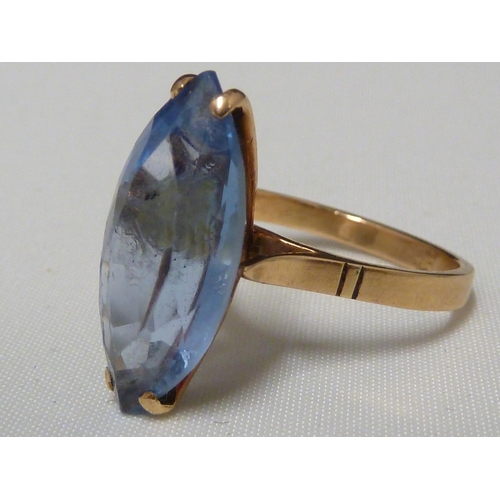 53 - An aquamarine set ring, set in pierced yellow metal, stamped with Arabic marks; a marquise ring and ... 