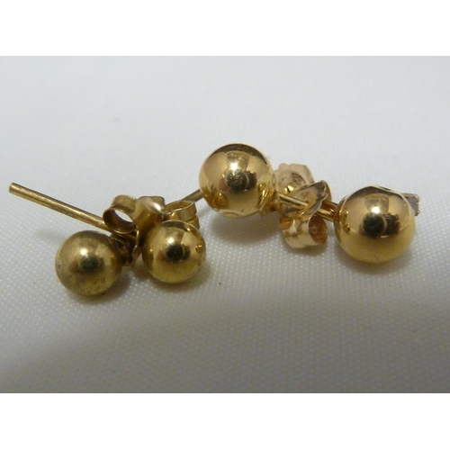 62 - A pair of 9ct yellow gold knot form earrings; and six pairs of yellow metal earrings, 10grms total w... 