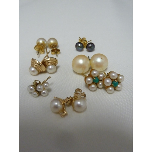 64 - Seven pairs of pearl stud earrings, yellow metal fittings (7)