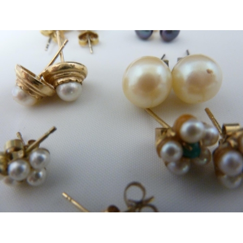 64 - Seven pairs of pearl stud earrings, yellow metal fittings (7)