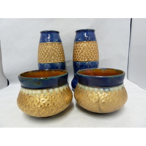 102 - A pair of Royal Doulton stoneware vases, of gourd form, banded in gold with incised swirls between b... 