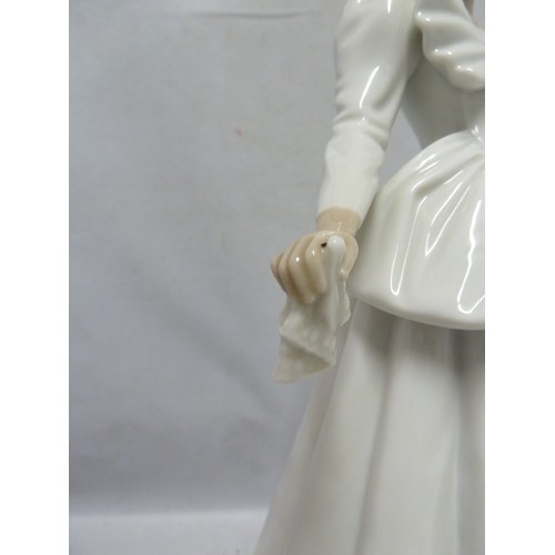 242 - Nao - a porcelain figure of a bride, a handkerchief in one hand, 29cm high; together with the origin... 