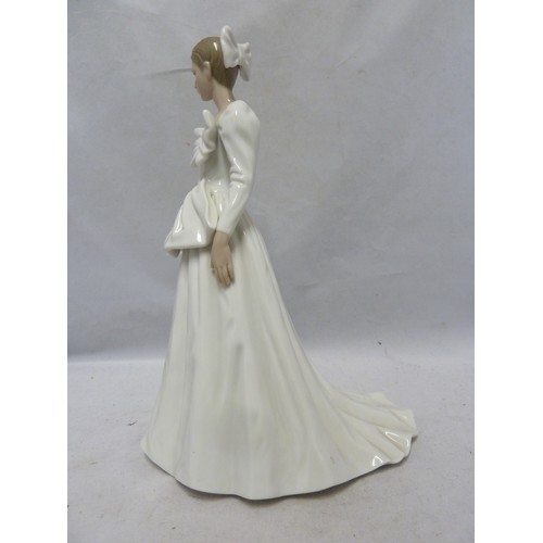 242 - Nao - a porcelain figure of a bride, a handkerchief in one hand, 29cm high; together with the origin... 