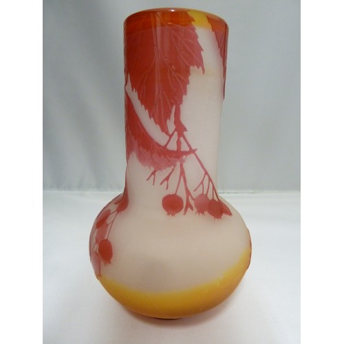 24 - Galle - a cameo glass vase, of onion form, the  cranberry coloured overlay cut through to frosted or... 