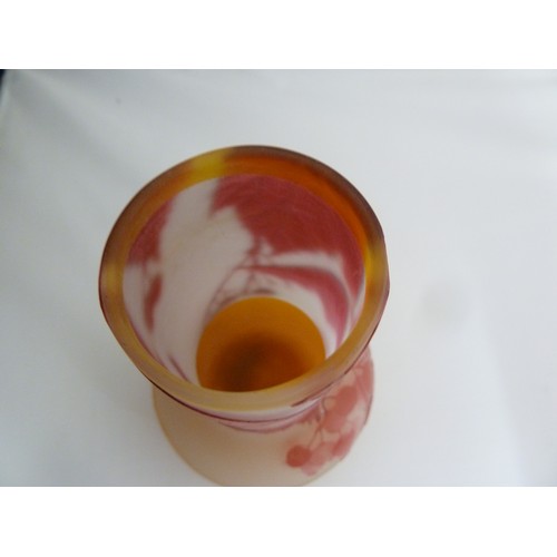 24 - Galle - a cameo glass vase, of onion form, the  cranberry coloured overlay cut through to frosted or... 