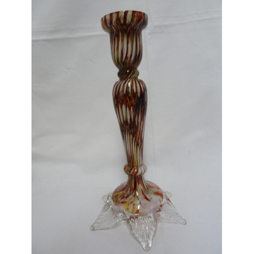 78 - Continental Glass - An End of Day glass socle candlestick, of ruby, yellow and green mottled glass o... 