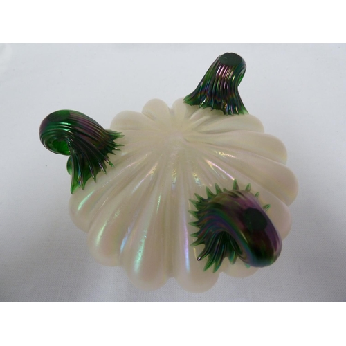 75 - Kralik - a white opalescent glass rose bowl, on three green rams horn feet and pierced metal cap gri... 