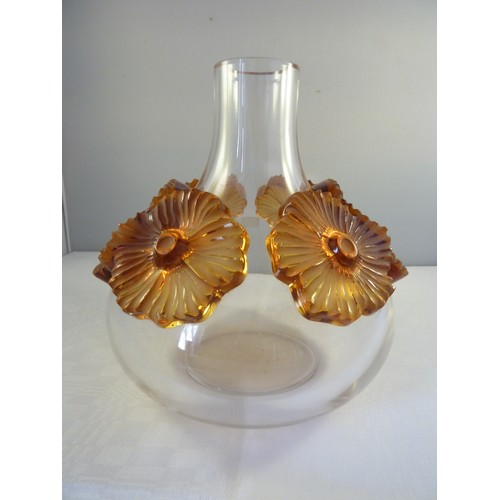 33 - Lalique - a Atossa flower vase, the colourless squat bottle form applied with high relief amber flow... 