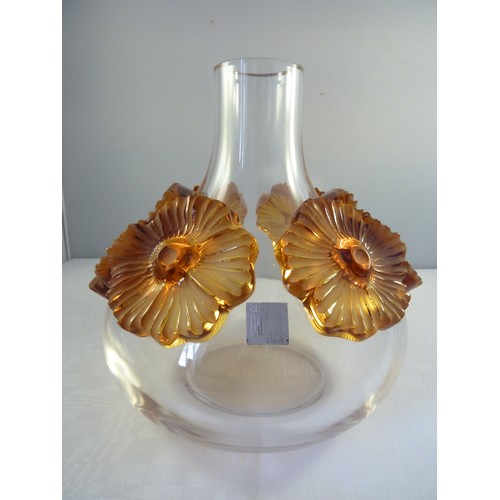 33 - Lalique - a Atossa flower vase, the colourless squat bottle form applied with high relief amber flow... 