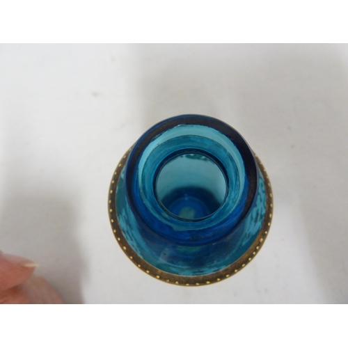 66 - Moser - a miniature glass vase, the bright turquoise colored body of baluster form enamelled and gil... 