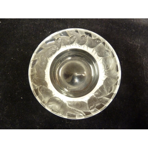 29 - R Lalique - an Irene glass pin dish, circular with deep well, the broad rim decorated with overlappi... 