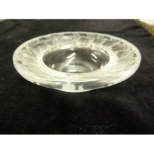 29 - R Lalique - an Irene glass pin dish, circular with deep well, the broad rim decorated with overlappi... 