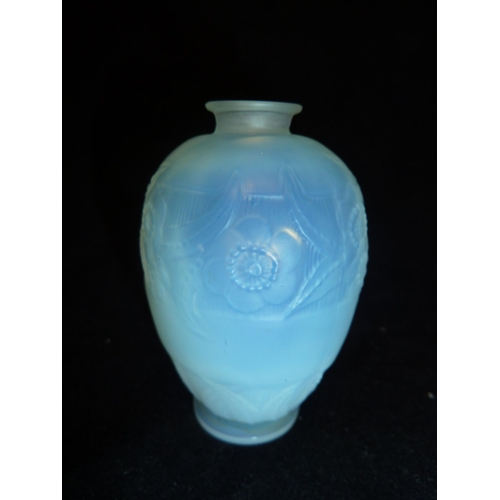 19 - Sabino - an opalescent glass scent bottle moulded with a band of flowers and leaves over a band of l... 