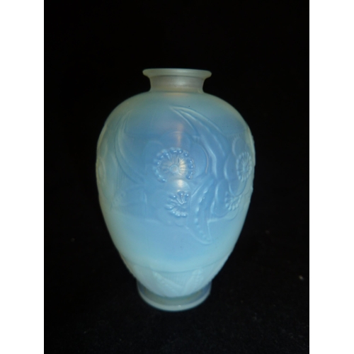 19 - Sabino - an opalescent glass scent bottle moulded with a band of flowers and leaves over a band of l... 