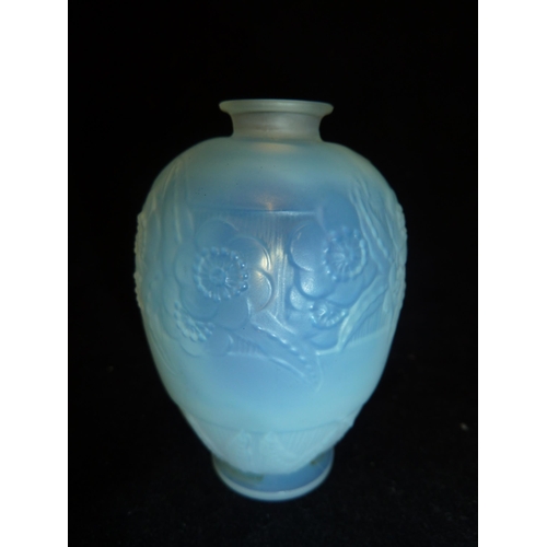 19 - Sabino - an opalescent glass scent bottle moulded with a band of flowers and leaves over a band of l... 