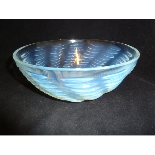 28 - R Lalique - a Ondes pattern glass bowl, the steep sides moulded with elliptical wavelets to the exte... 