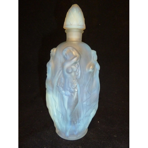 20 - Sabino - a Maidens opalescent glass perfume bottle, of slender oval form moulded with scantily clad ... 