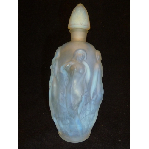 20 - Sabino - a Maidens opalescent glass perfume bottle, of slender oval form moulded with scantily clad ... 