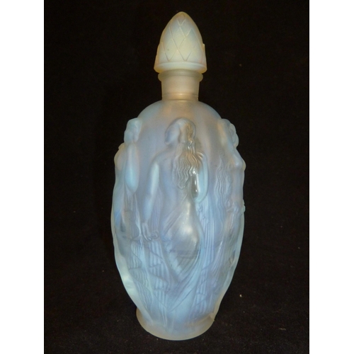 20 - Sabino - a Maidens opalescent glass perfume bottle, of slender oval form moulded with scantily clad ... 