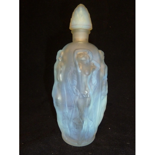 20 - Sabino - a Maidens opalescent glass perfume bottle, of slender oval form moulded with scantily clad ... 