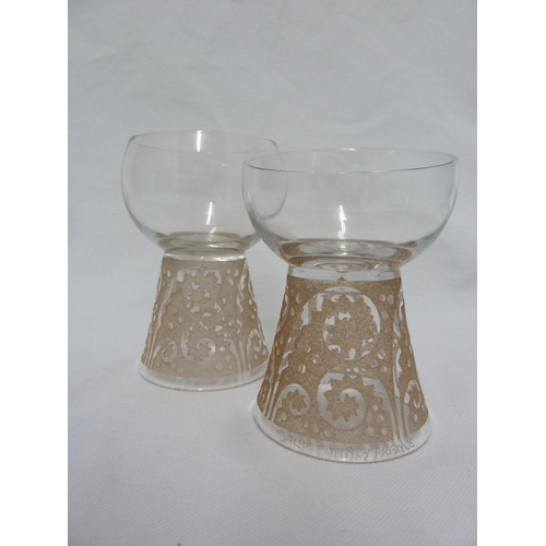 8 - Daum - two Art Deco wine glasses, acid cut design of stylised fern fronds with caramel patination to... 