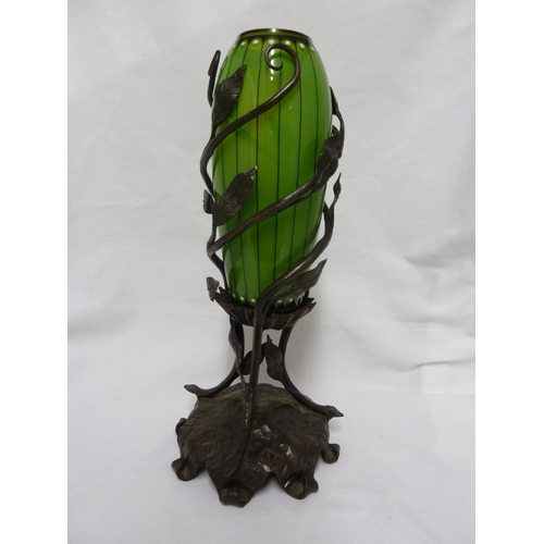 39 - Continental Glass - a Secessionist green opal and black enamel vase, mounted on a wrought iron base ... 