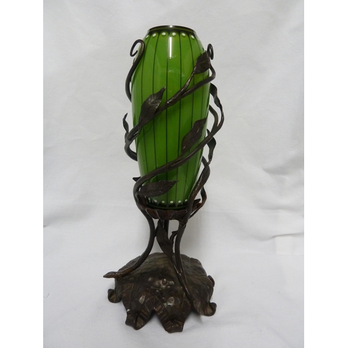 39 - Continental Glass - a Secessionist green opal and black enamel vase, mounted on a wrought iron base ... 