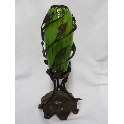 39 - Continental Glass - a Secessionist green opal and black enamel vase, mounted on a wrought iron base ... 