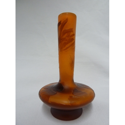 27 - Galle - a cameo glass vase, of flattened bottle form, the brown overlay cut through to orange with a... 