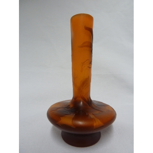 27 - Galle - a cameo glass vase, of flattened bottle form, the brown overlay cut through to orange with a... 