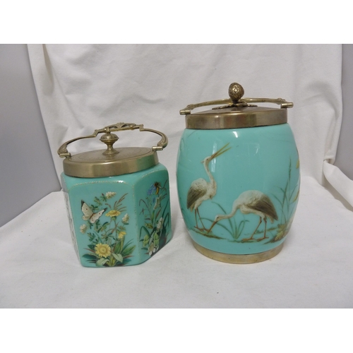 63 - Bohemian Glass - two turquoise glass biscuit barrels, enamelled in polychrome colours with a stork i... 