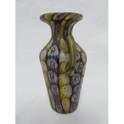 180 - Fratelli Toso - a fused millifiore cane glass vase, of baluster form between two handles, lavender/c... 