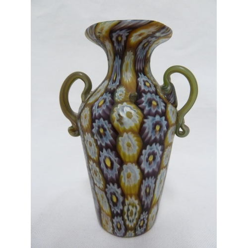 180 - Fratelli Toso - a fused millifiore cane glass vase, of baluster form between two handles, lavender/c... 