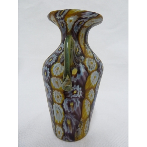 180 - Fratelli Toso - a fused millifiore cane glass vase, of baluster form between two handles, lavender/c... 