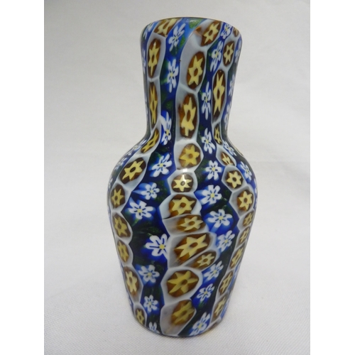 179 - Fratelli Toso - a fused millifiore cane glass vase of blue, white and yellow canes, baluster form,  ... 